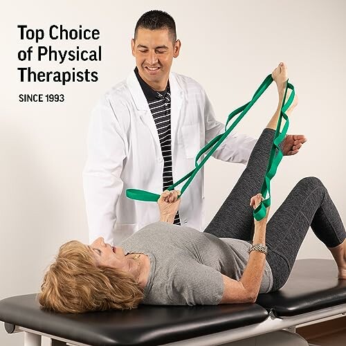 Physical therapist assisting a woman with an exercise band.