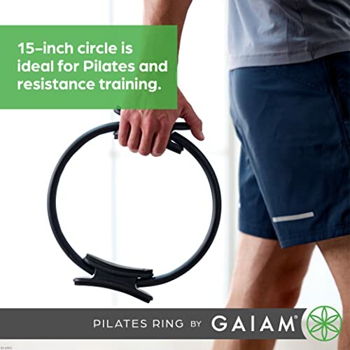 Person holding 15-inch Pilates ring for resistance training